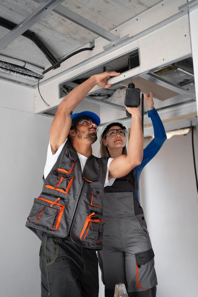 2149366669 (1) Workers using hvac manifold indicators